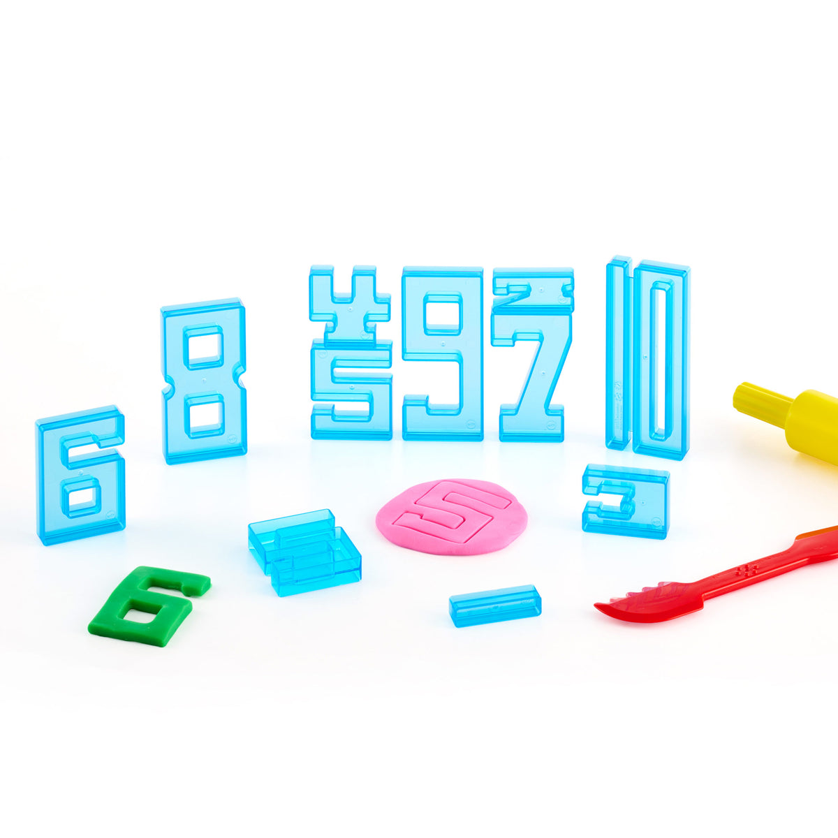 A set of colorful translucent plastic number and letter building blocks arranged on a white background, including blue numbers, a green letter, a pink letter, and yellow and red tools.